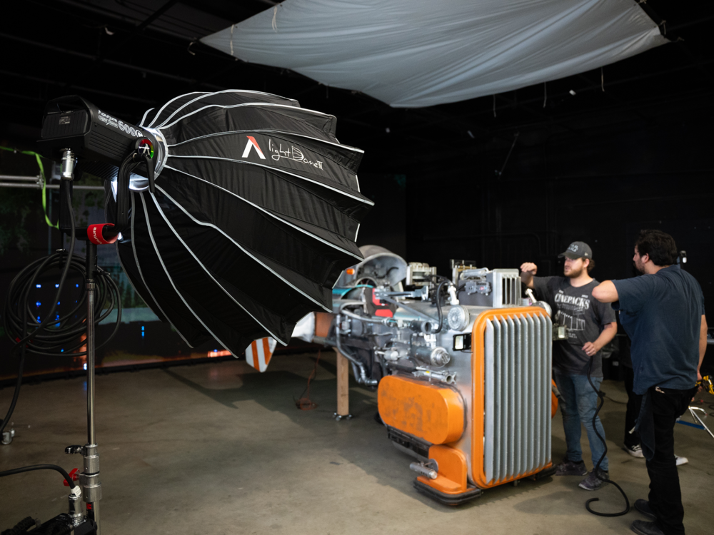 The Light Dome III being used on an studio production set to diffuse light from the Aputure LS 600c Pro.